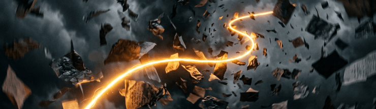 Scattered papers swirling in a dark stormy sky with a bright orange light trail moving through them